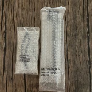 Avon eyebrow brush & tweezers.